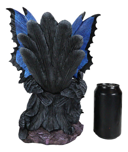 Gothic Raven Crow Fairy Queen in Blue Gown Sitting on Throne of Crows Statue