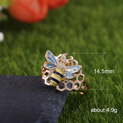 Inlaid Bee on Honeycomb Ring