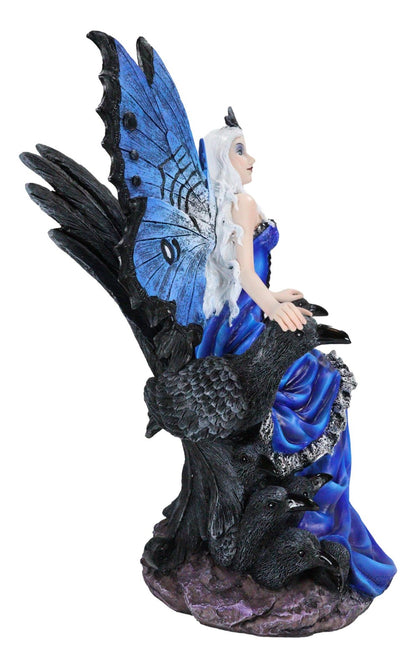 Gothic Raven Crow Fairy Queen in Blue Gown Sitting on Throne of Crows Statue