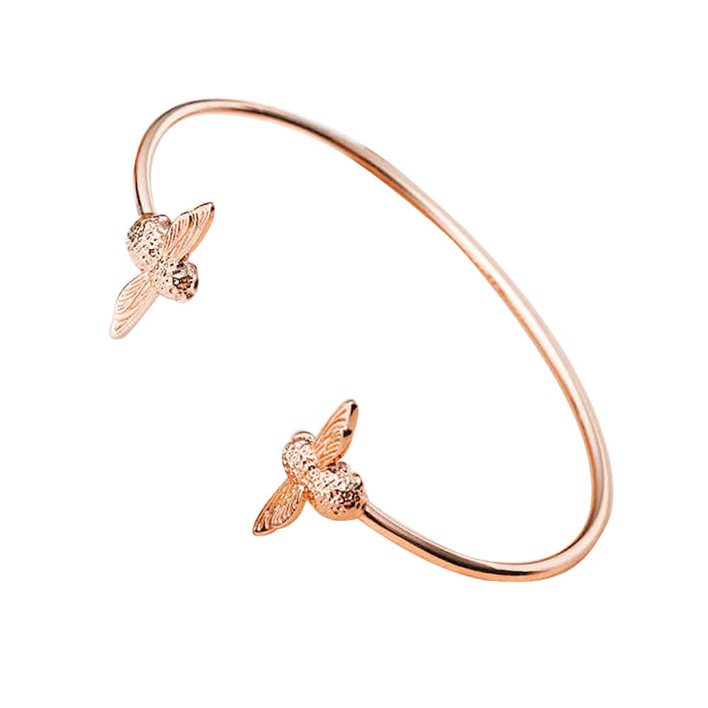 Rose gold colored “bee bracelet”.