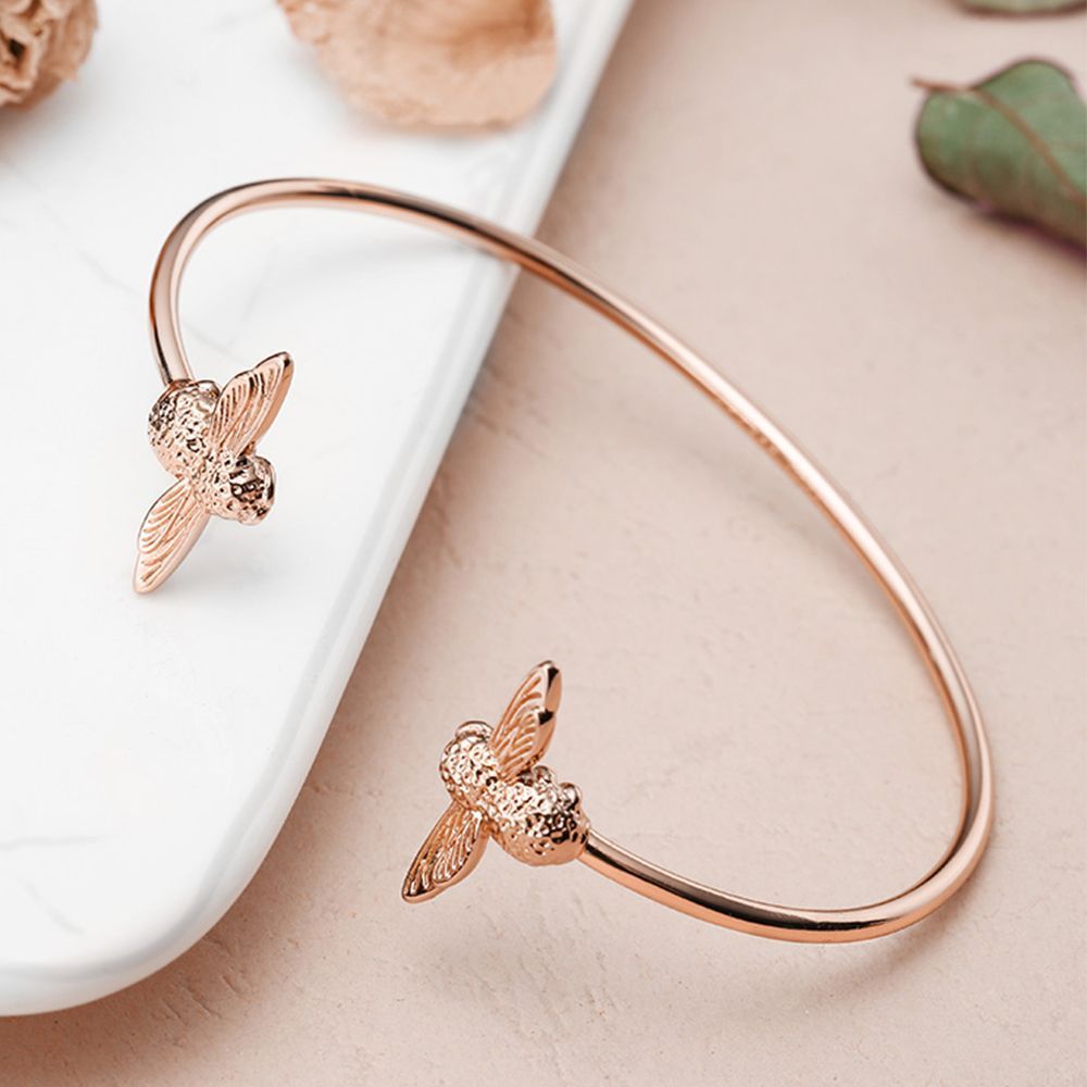 Rose gold colored “bee bracelet”.